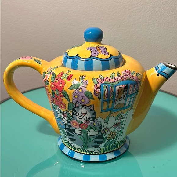Vibrant Yellow and Blue Ceramic Teapot with Whimsical Designs - Picture 3 of 6